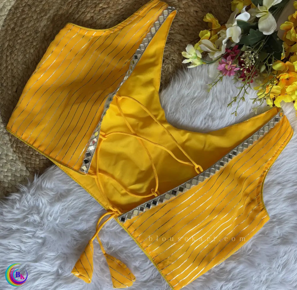 designer party women georgette v neck sleeveless mirror work yellow blouse | 1676