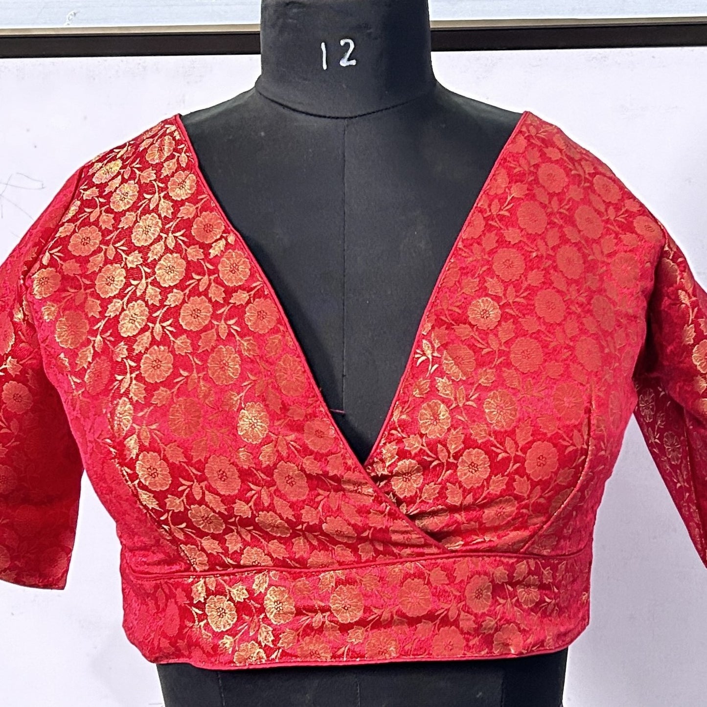 Blousekart Trendy Silk Front Belt Blouse with Cross V-Neck Floral Design and 3/4 Sleeves - Perfect for Parties, Nights Out, and Special Occasions